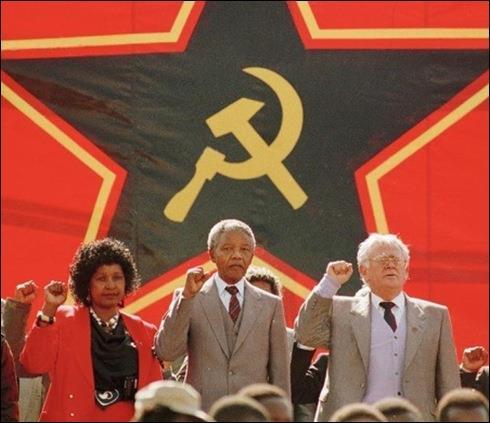Mandela à coté de Joe Slovo secrétaire Général du SACP lors de son premier meeting à la fin de l'apartheid quand le parti est redevenu légal