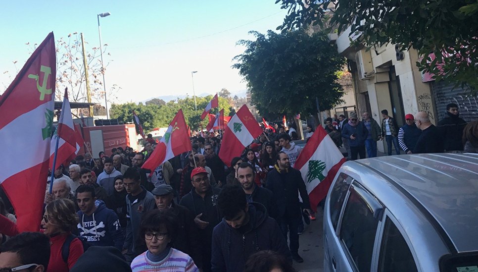 Au Liban, des milliers de communistes manifestent contre le système électoral Au Liban, des milliers de communistes manifestent contre le système électoral