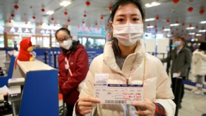 Covid-19 : la Chine prête à accueillir les enquêteurs de l'OMS Covid-19 : la Chine prête à accueillir les enquêteurs de l'OMS